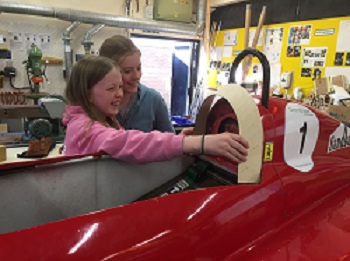 Phoebe and Cerys fix Dylans seat 350 pixels